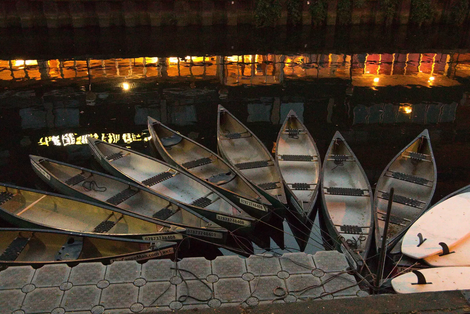 Nicely-arranged canoes on the river at Norwich, from A Trip to Nando's, Riverside, Norwich, Norfolk - 23rd July 2021