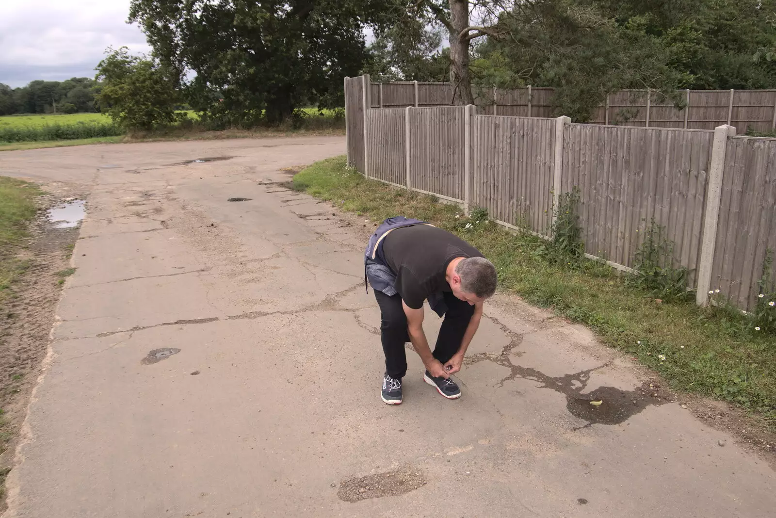 Sean ties his shoe-laces up again, from Meg-fest, and Sean Visits, Bressingham and Brome, Suffolk - 1st August 2021