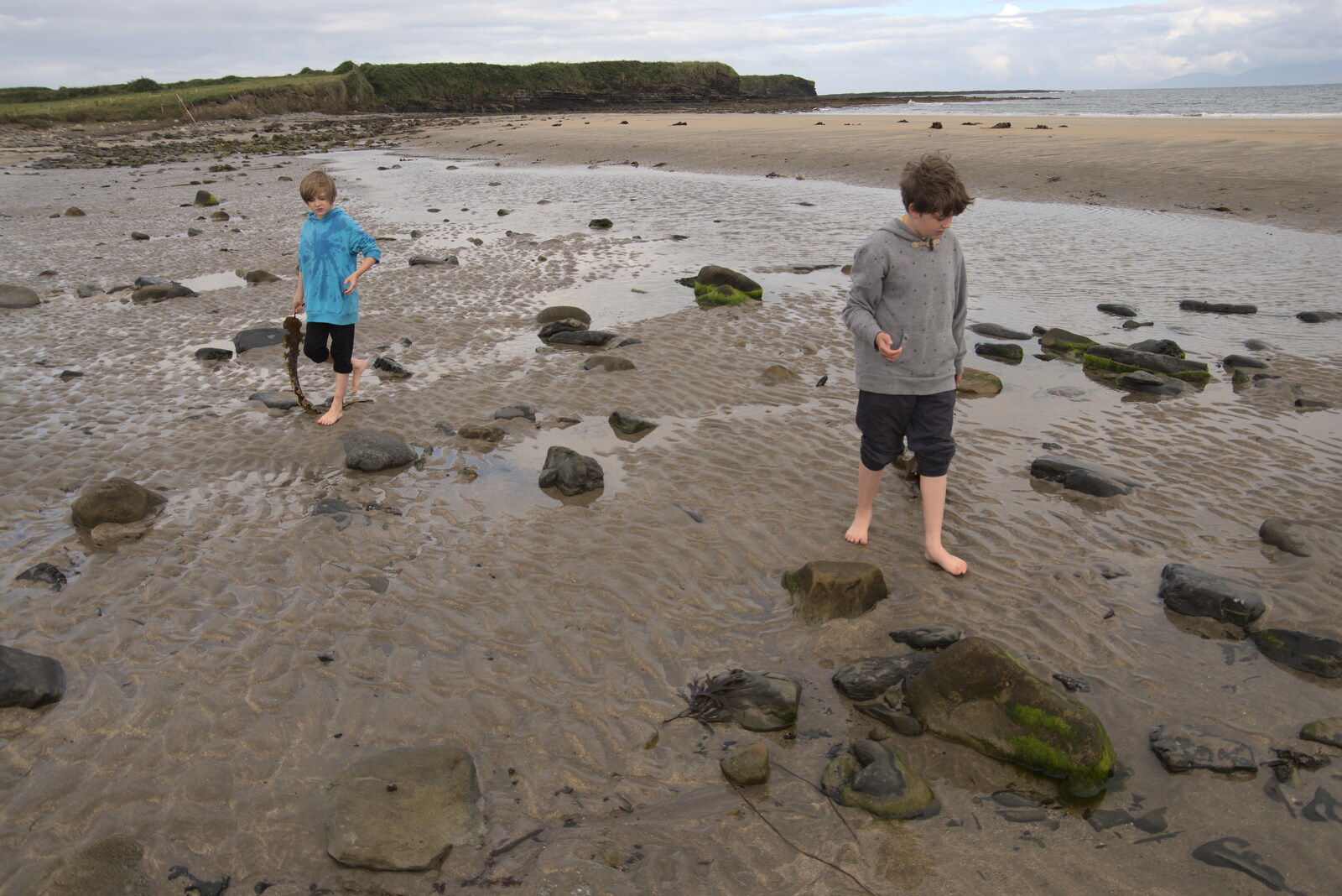 Pints of Guinness and Streedagh Beach, Grange and Sligo, Ireland - 9th August 2021: The boys roam around on the beach