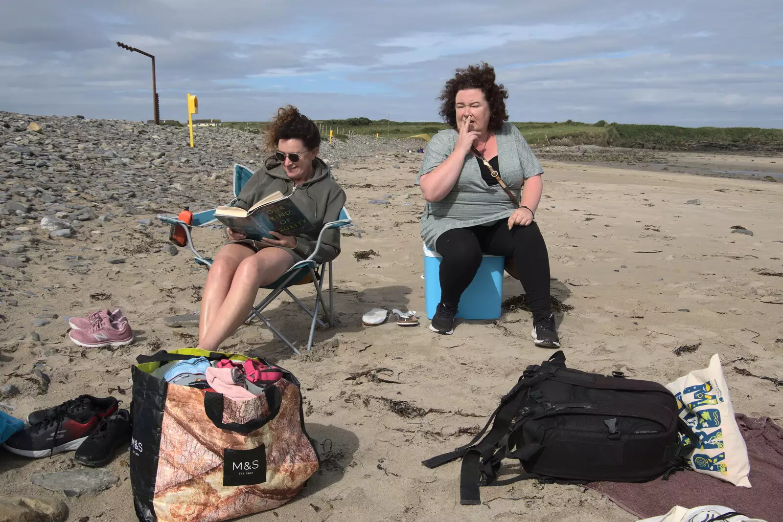 Evelyn reads, whilst Do Wheeze has a fag on, from Pints of Guinness and Streedagh Beach, Grange and Sligo, Ireland - 9th August 2021