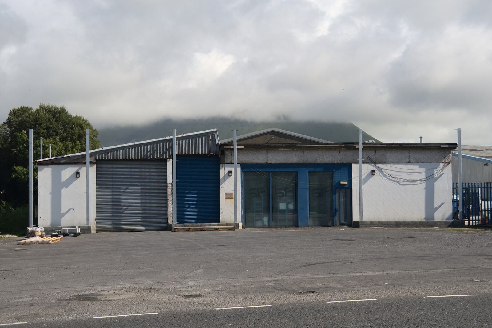 Pints of Guinness and Streedagh Beach, Grange and Sligo, Ireland - 9th August 2021: A derelict building over the road from SuperValu