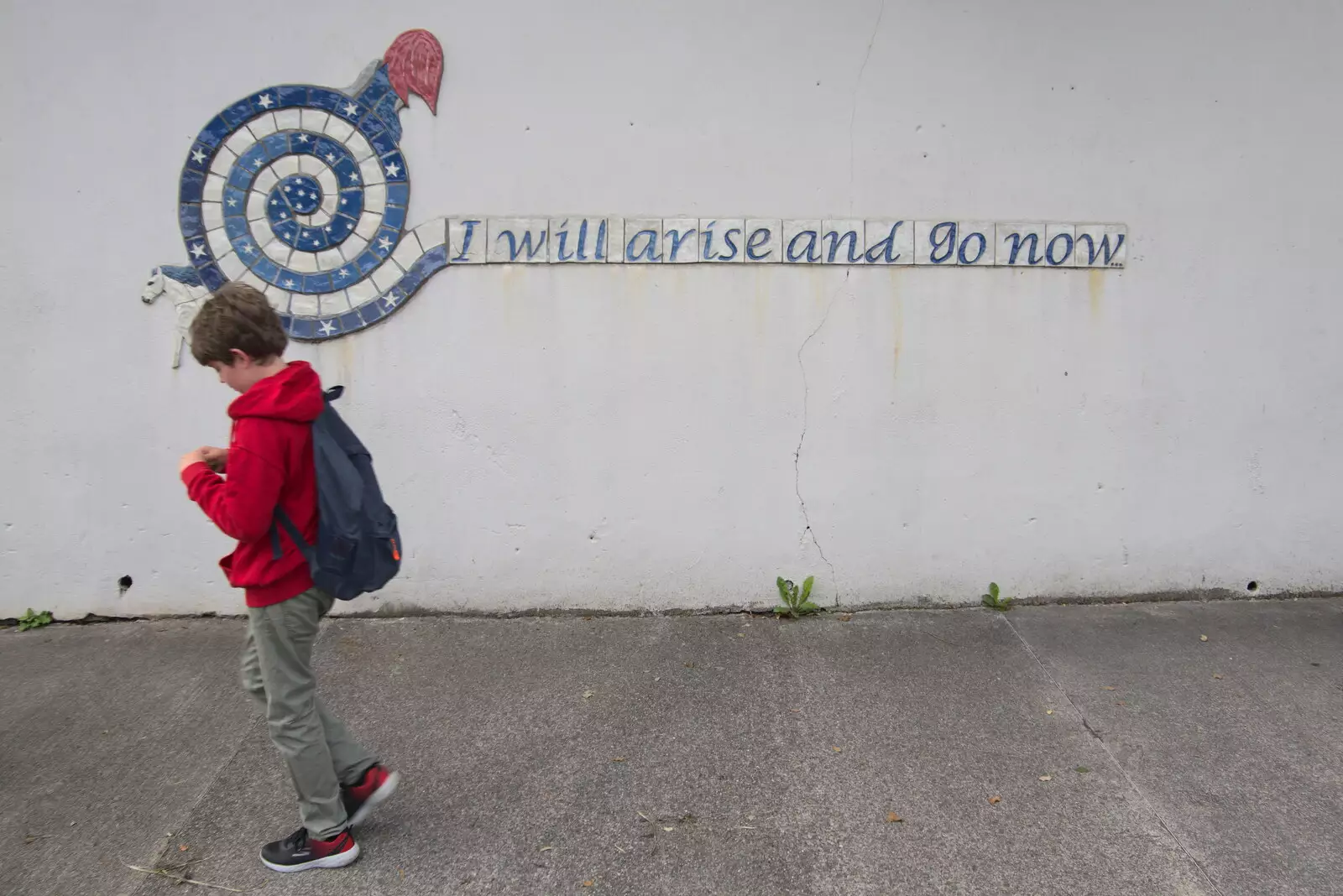 Fred walks past a WB Yeats quote on The Mall, from Pints of Guinness and Streedagh Beach, Grange and Sligo, Ireland - 9th August 2021