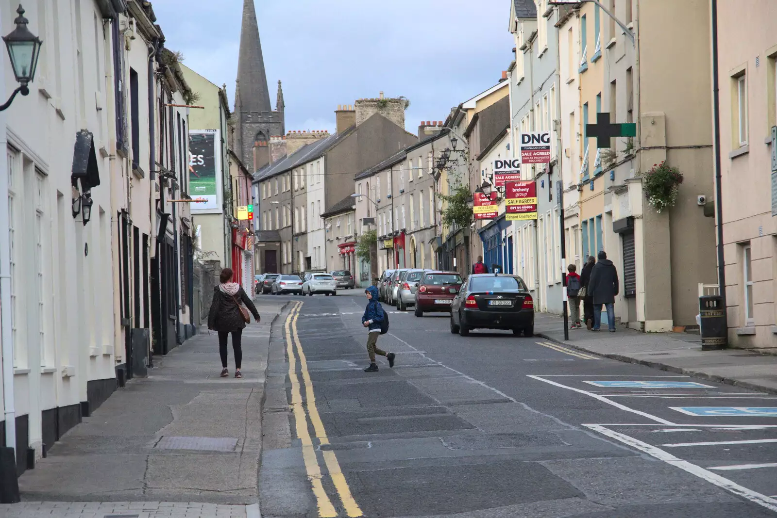 Harry runs across The Mall, from Pints of Guinness and Streedagh Beach, Grange and Sligo, Ireland - 9th August 2021