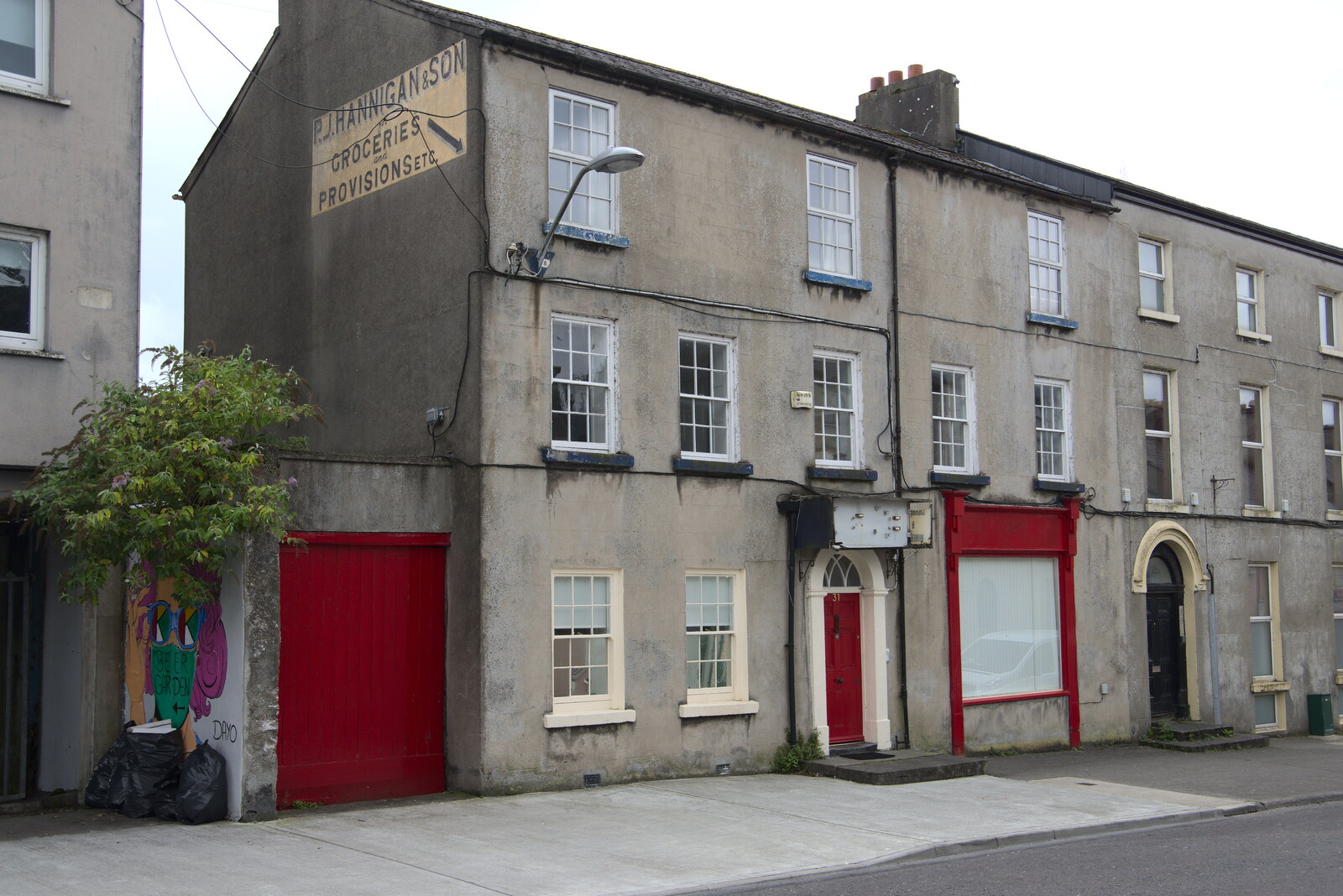 A Trip to Manorhamilton, County Leitrim, Ireland - 11th August 2021: The old PJ Hannigan grocers on The Mall
