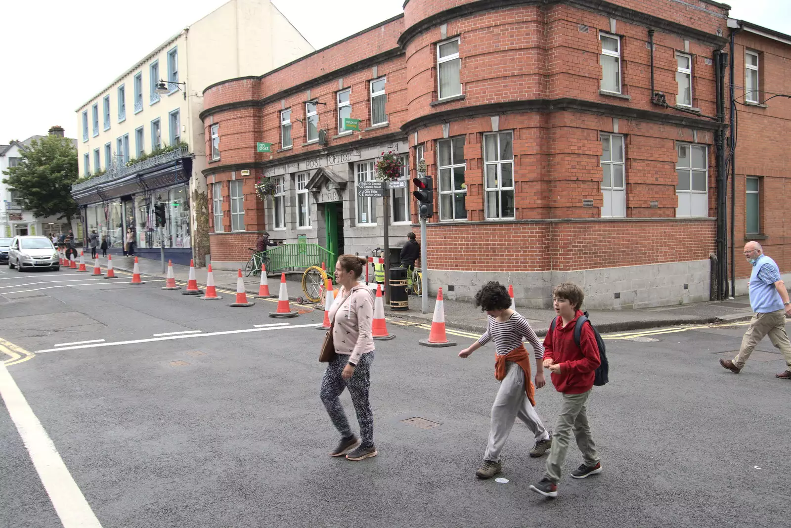 Crossing the street by the old Post Office, from A Trip to Manorhamilton, County Leitrim, Ireland - 11th August 2021