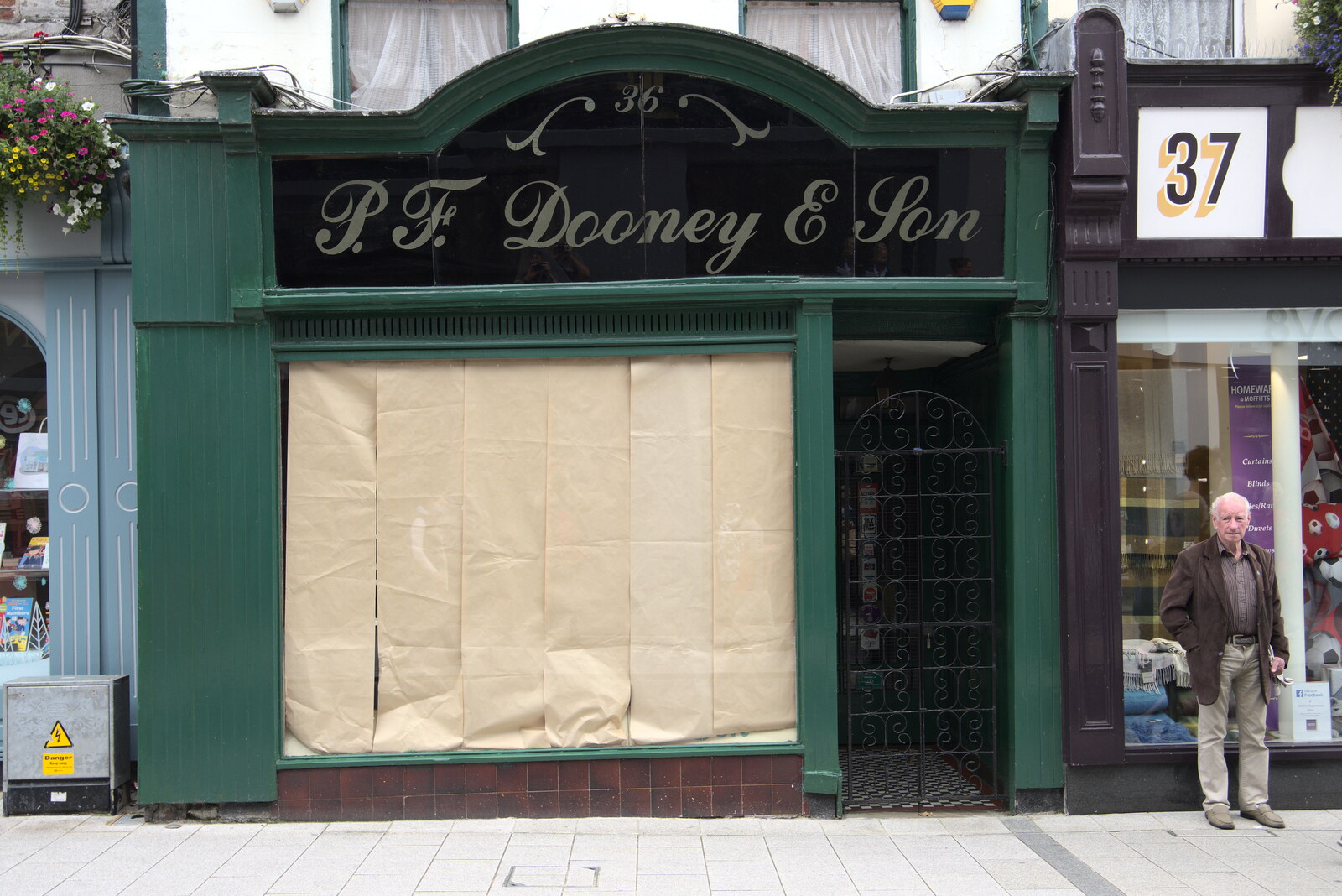 A Trip to Manorhamilton, County Leitrim, Ireland - 11th August 2021: The closed-down P F Dooney and Son