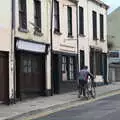 Some dude pushes a bike up The Mall, A Trip to Manorhamilton, County Leitrim, Ireland - 11th August 2021