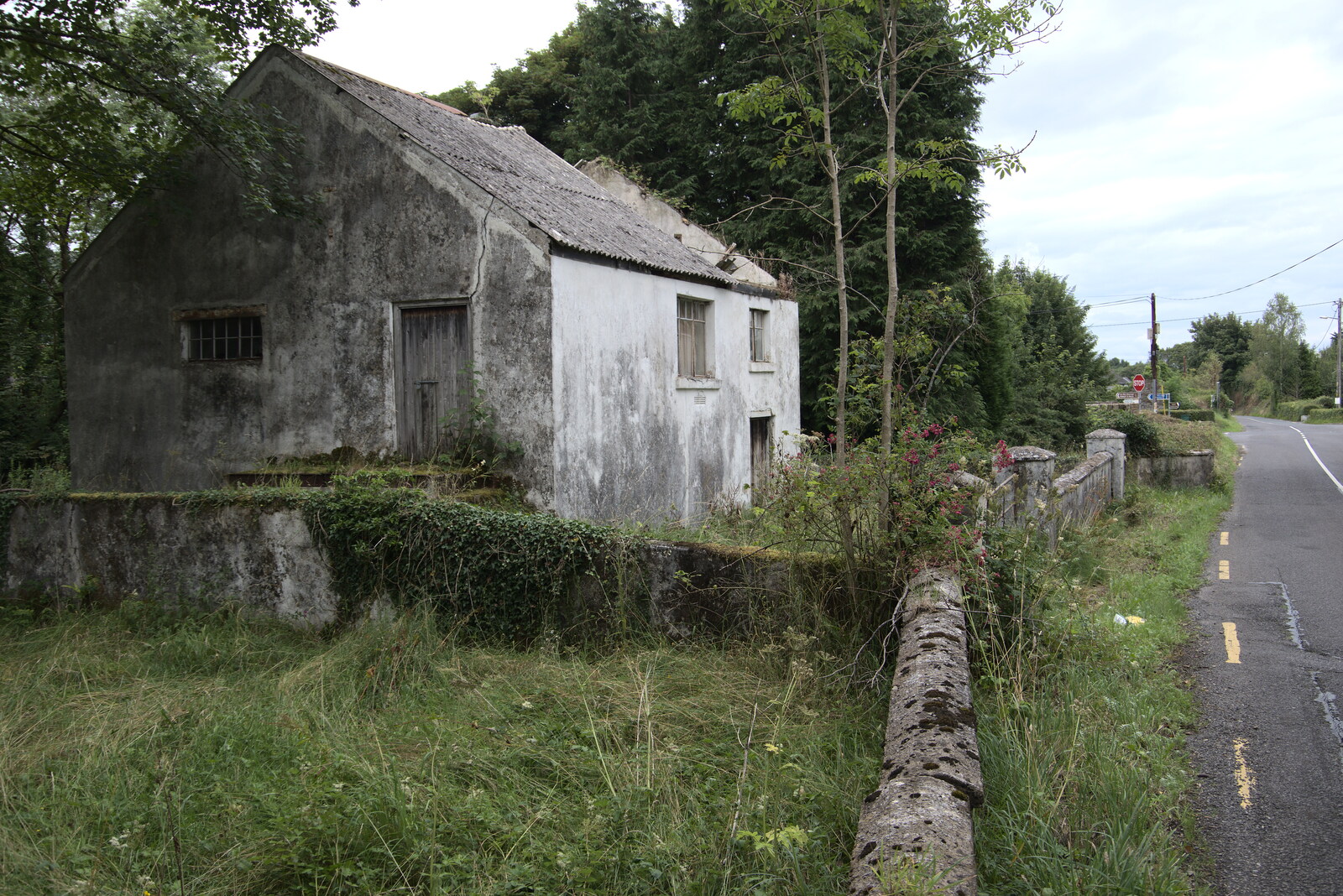 A Trip to Manorhamilton, County Leitrim, Ireland - 11th August 2021: The derelict house on the R282