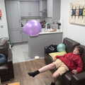 2021 Fred kicks balloons around the apartment