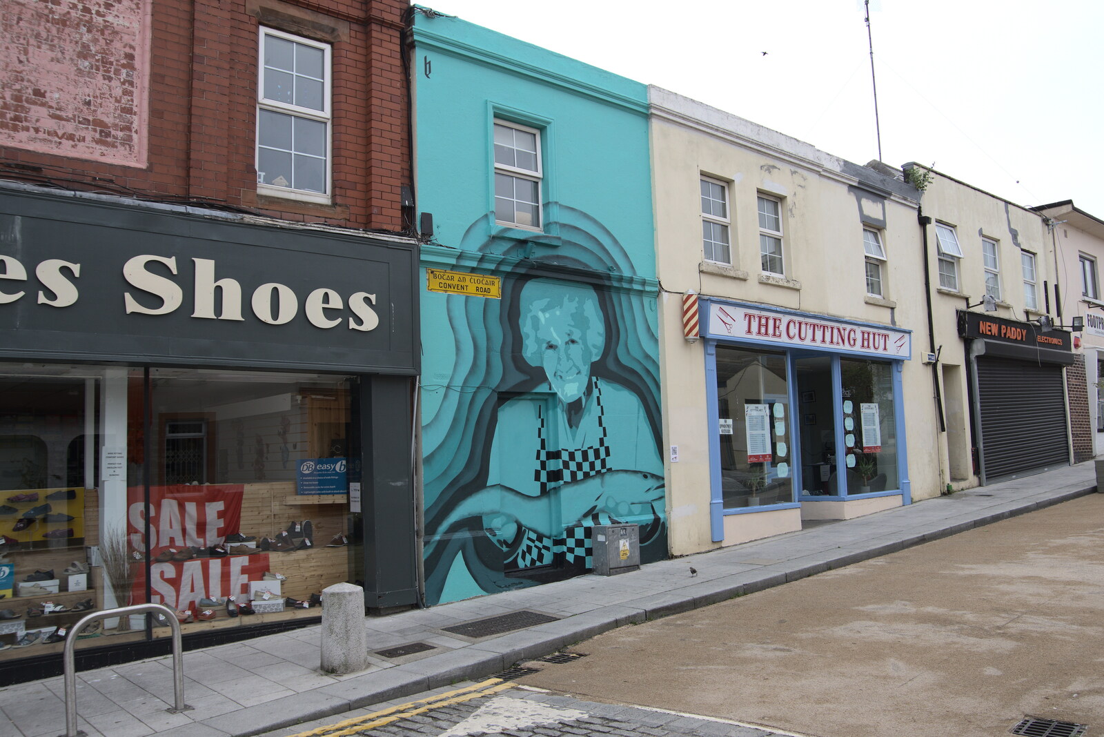 A wall mural of a fish monger from Manorhamilton and the Street Art of Dún Laoghaire, Ireland - 15th August 2021