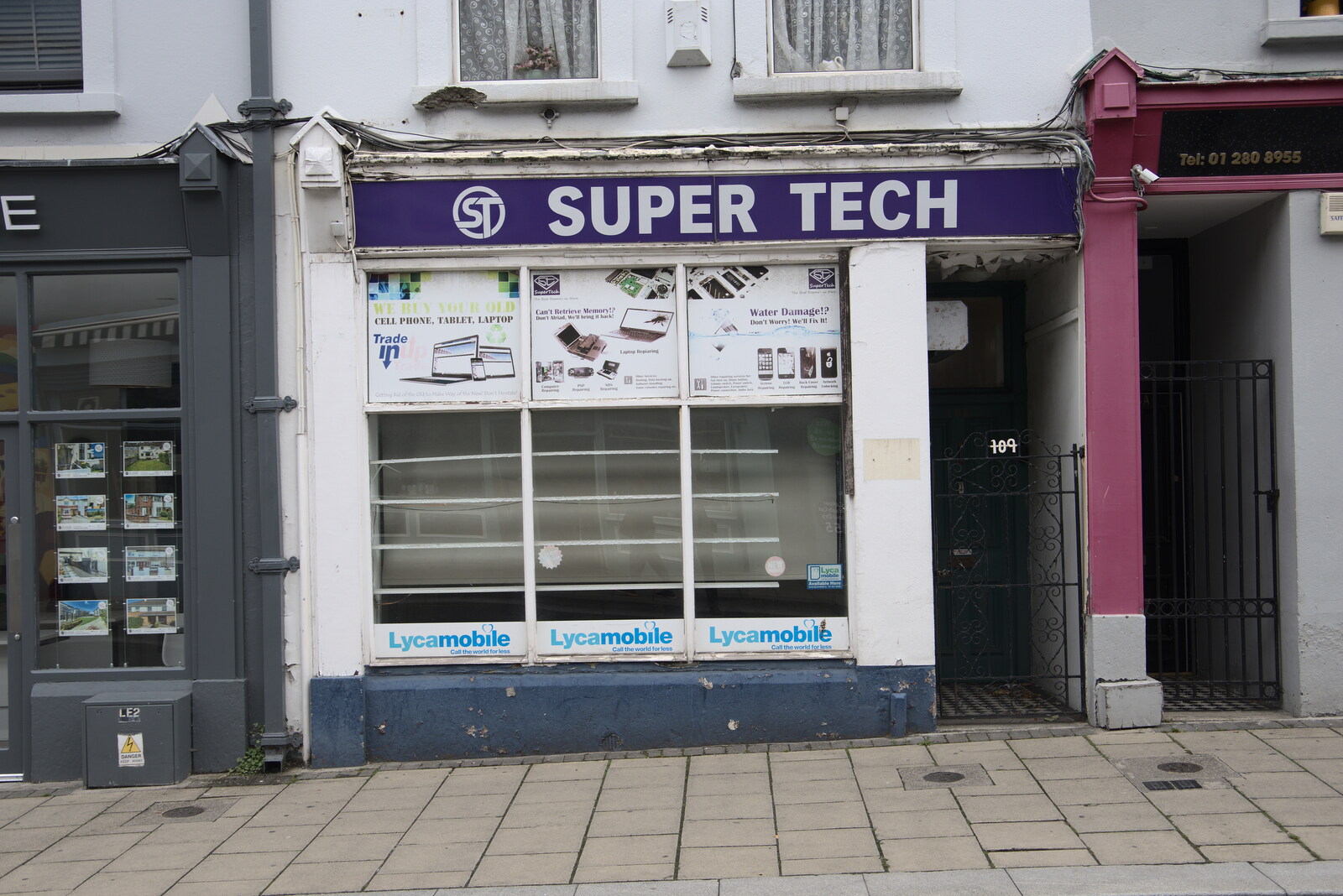 Super Tech derelict phone shop from Manorhamilton and the Street Art of Dún Laoghaire, Ireland - 15th August 2021
