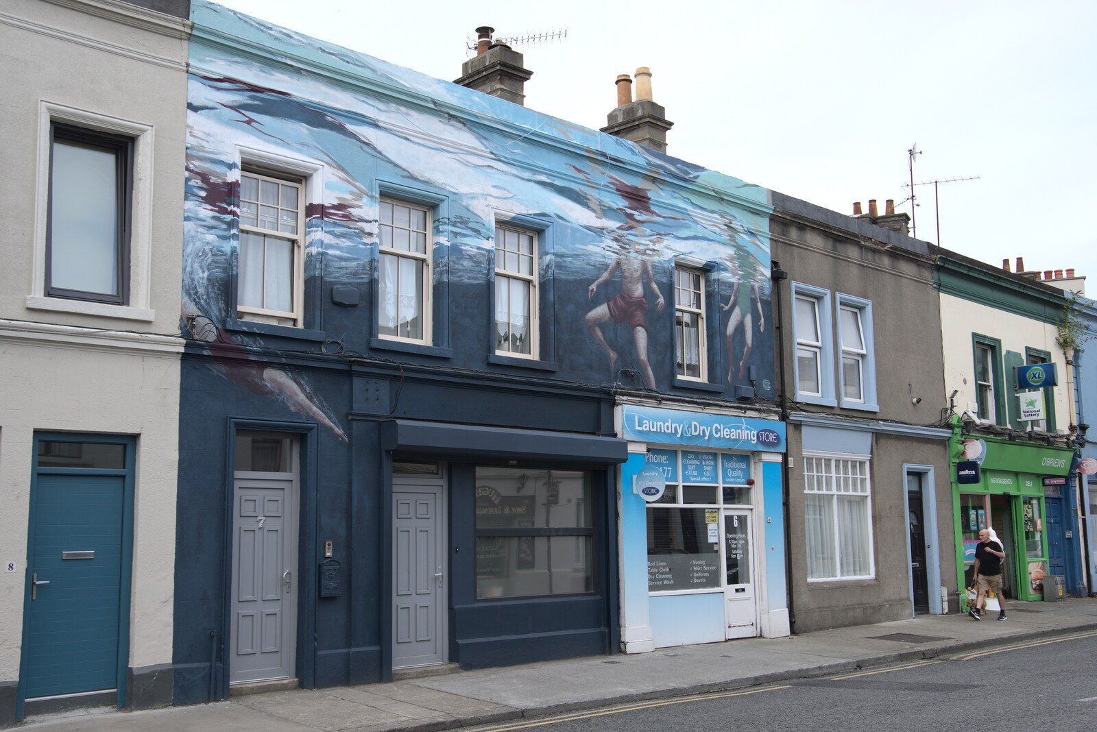 An entire swimming scene on a building from Manorhamilton and the Street Art of Dún Laoghaire, Ireland - 15th August 2021