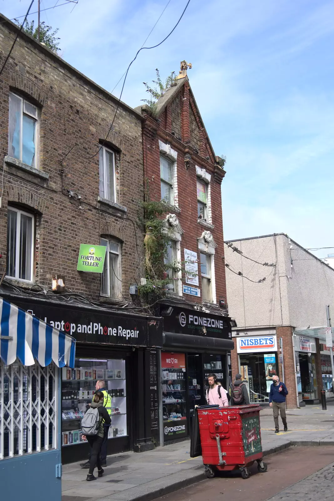 A shop with foliage growing out of it, from A Trip to Noddy's, and Dublin City Centre, Wicklow and Dublin, Ireland - 16th August 2021