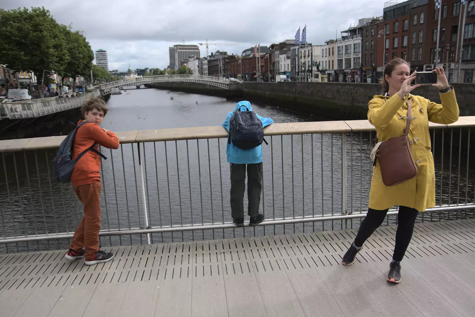 Harry hangs over the Millenium Bridge, from A Trip to Noddy's, and Dublin City Centre, Wicklow and Dublin, Ireland - 16th August 2021