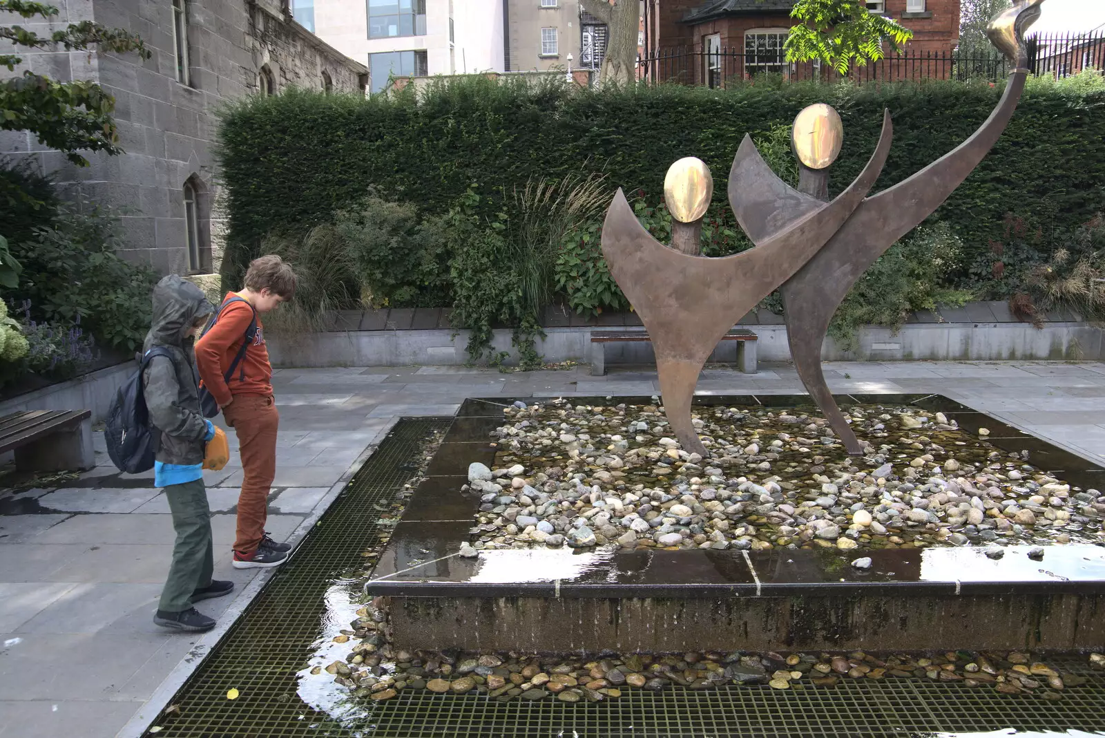 The boys look at coins in a water feature, from A Trip to Noddy's, and Dublin City Centre, Wicklow and Dublin, Ireland - 16th August 2021