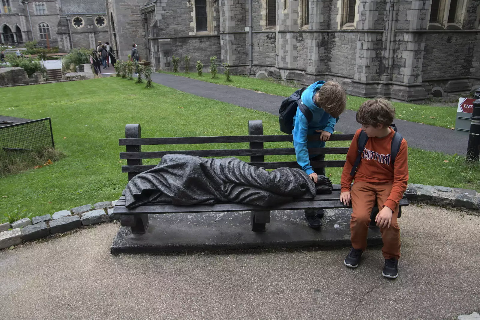 The boys poke a statue on a bench, from A Trip to Noddy's, and Dublin City Centre, Wicklow and Dublin, Ireland - 16th August 2021