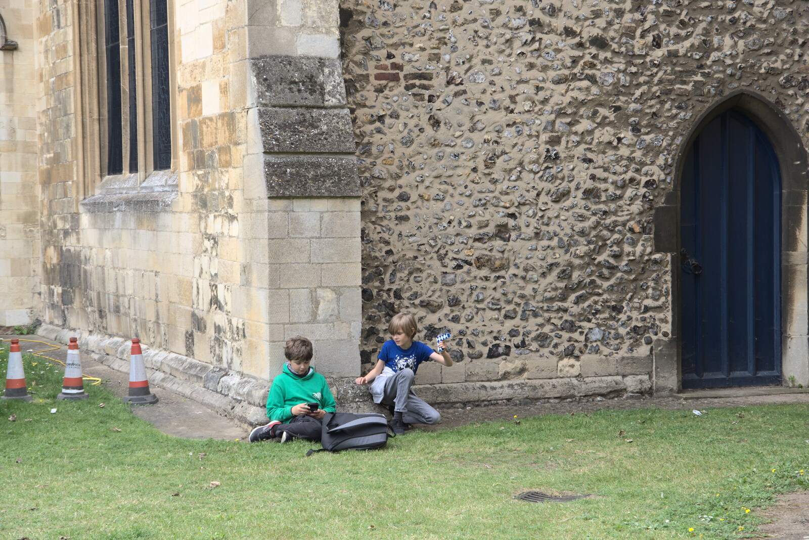 The boys lean against a wall as we queue from Dippy and the City Dinosaur Trail, Norwich, Norfolk - 19th August 2021