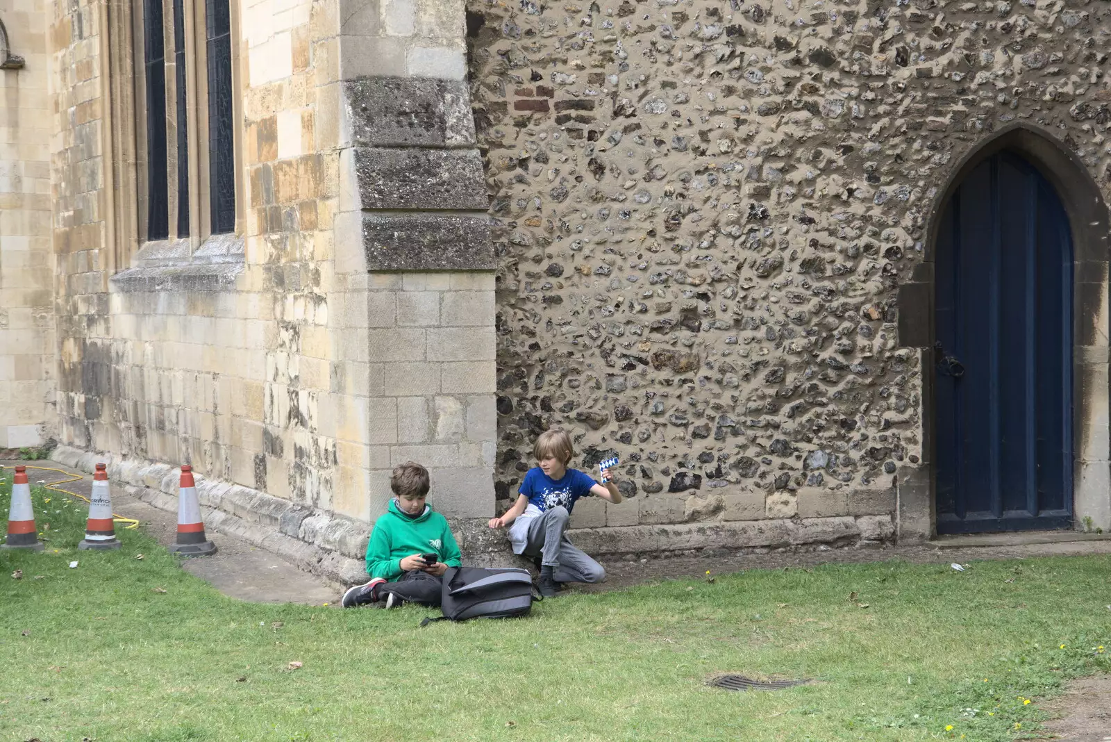 The boys lean against a wall as we queue, from Dippy and the City Dinosaur Trail, Norwich, Norfolk - 19th August 2021