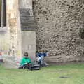 The boys lean against a wall as we queue, Dippy and the City Dinosaur Trail, Norwich, Norfolk - 19th August 2021