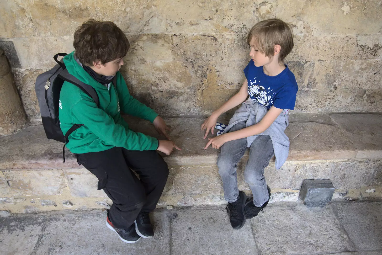 Fred and Harry discover a carved board game, from Dippy and the City Dinosaur Trail, Norwich, Norfolk - 19th August 2021