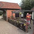 Paul checks his phone in the beer garden, The BSCC at The Crown, Dickleburgh, Norfolk - 19th August 2021