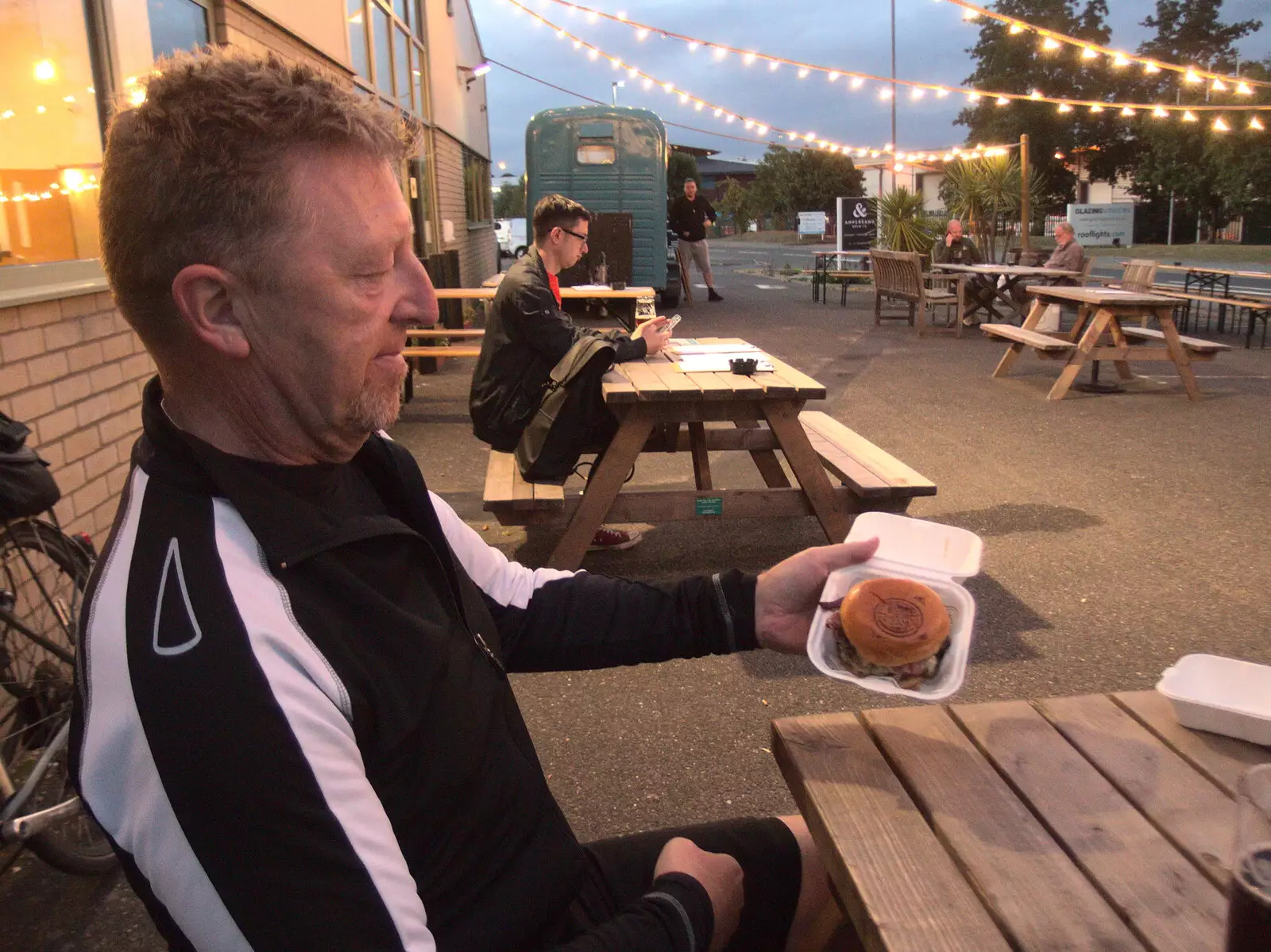 Gaz shows off another Burger Jam burger, from The BSCC at The Crown, Dickleburgh, Norfolk - 19th August 2021