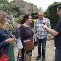 Petay shows a photo, Petay's Wedding Reception, Fanhams Hall, Ware, Hertfordshire - 20th August 2021