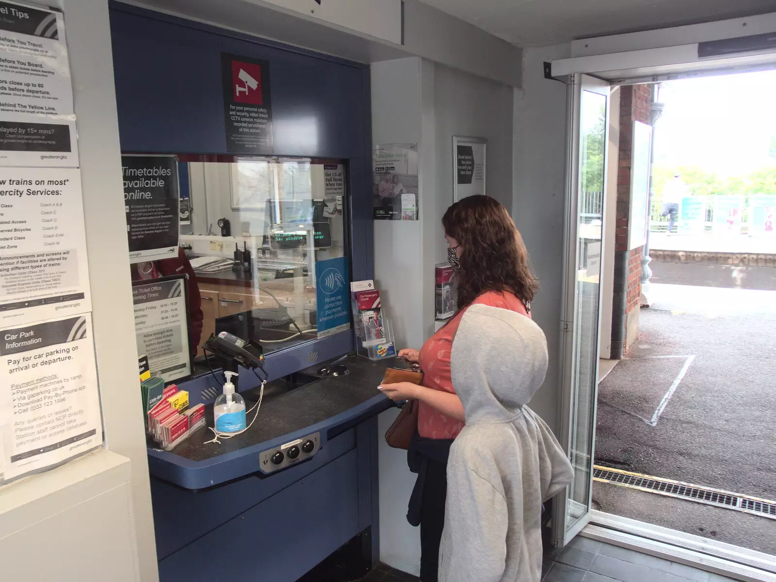 Isobel at the station ticket office, from Head Out Not Home: A Music Day, Norwich, Norfolk - 22nd August 2021