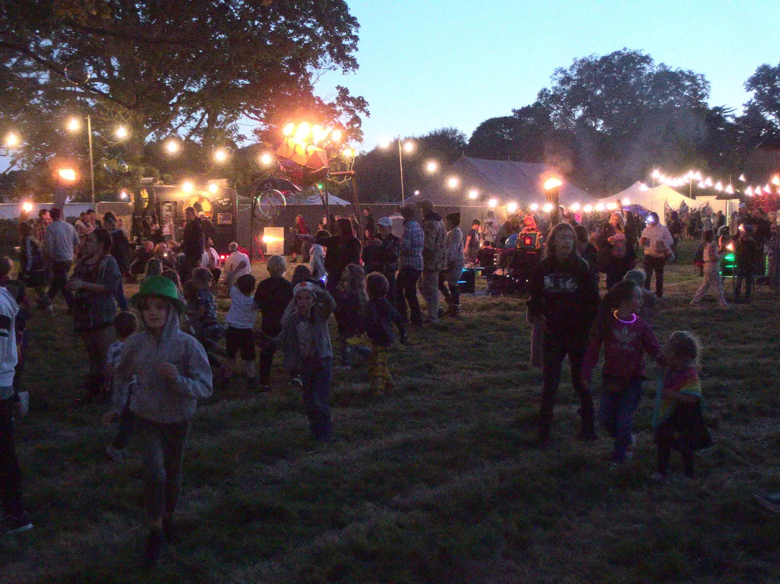 Harry runs around with a green hat on, from Maui Waui Festival, Hill Farm, Gressenhall, Norfolk - 28th August 2021