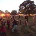 Children chase bubbles around, Maui Waui Festival, Hill Farm, Gressenhall, Norfolk - 28th August 2021
