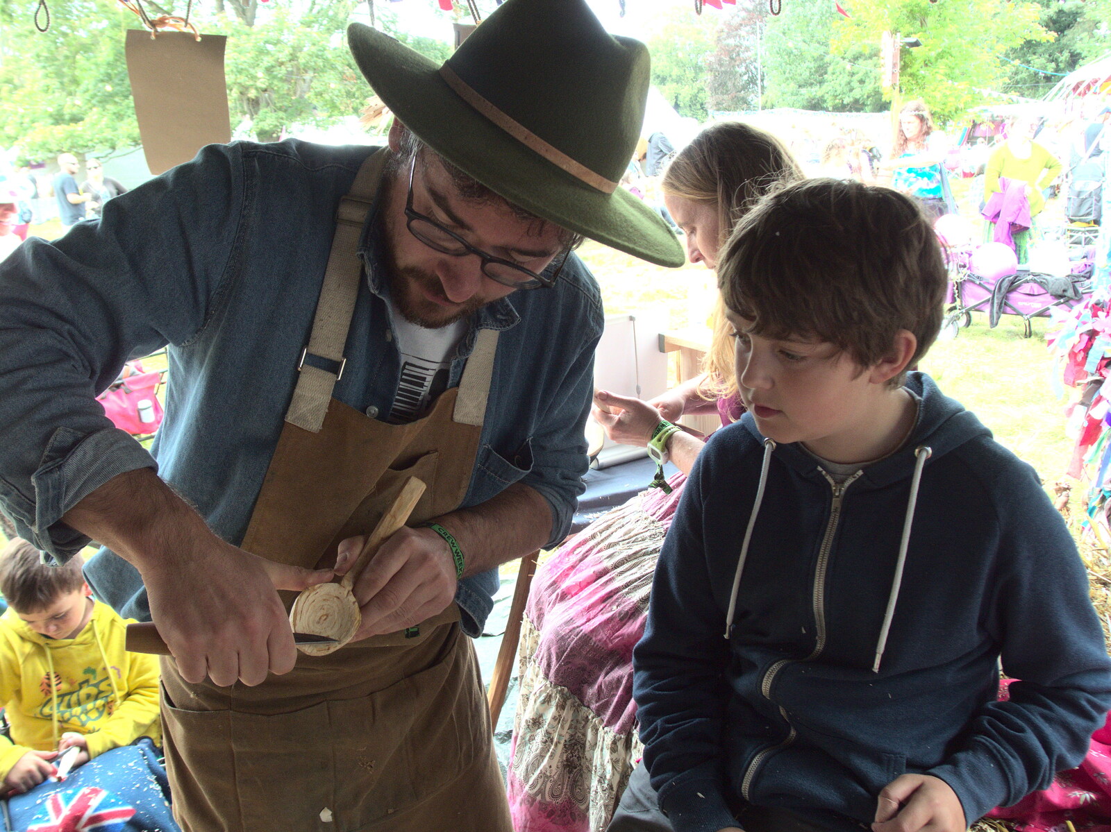 Fred learns some carving techniques from Maui Waui Festival, Hill Farm, Gressenhall, Norfolk - 28th August 2021