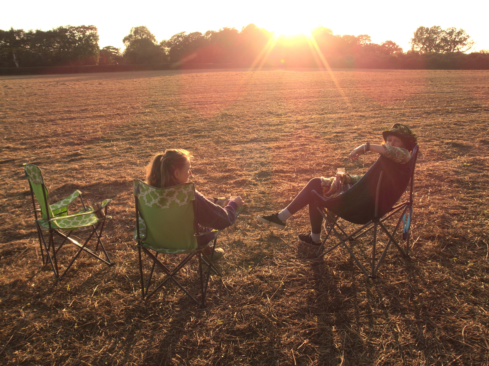 Allyson and Isobel have a late-evening drink from Maui Waui Festival, Hill Farm, Gressenhall, Norfolk - 28th August 2021