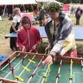 Harry and Isobel do Table Football, Maui Waui Festival, Hill Farm, Gressenhall, Norfolk - 28th August 2021