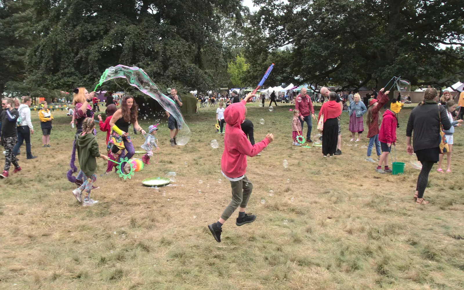 Harry leaps after bubbles, from Maui Waui Festival, Hill Farm, Gressenhall, Norfolk - 28th August 2021