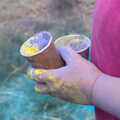2021 Yellow and purple paint in a pot