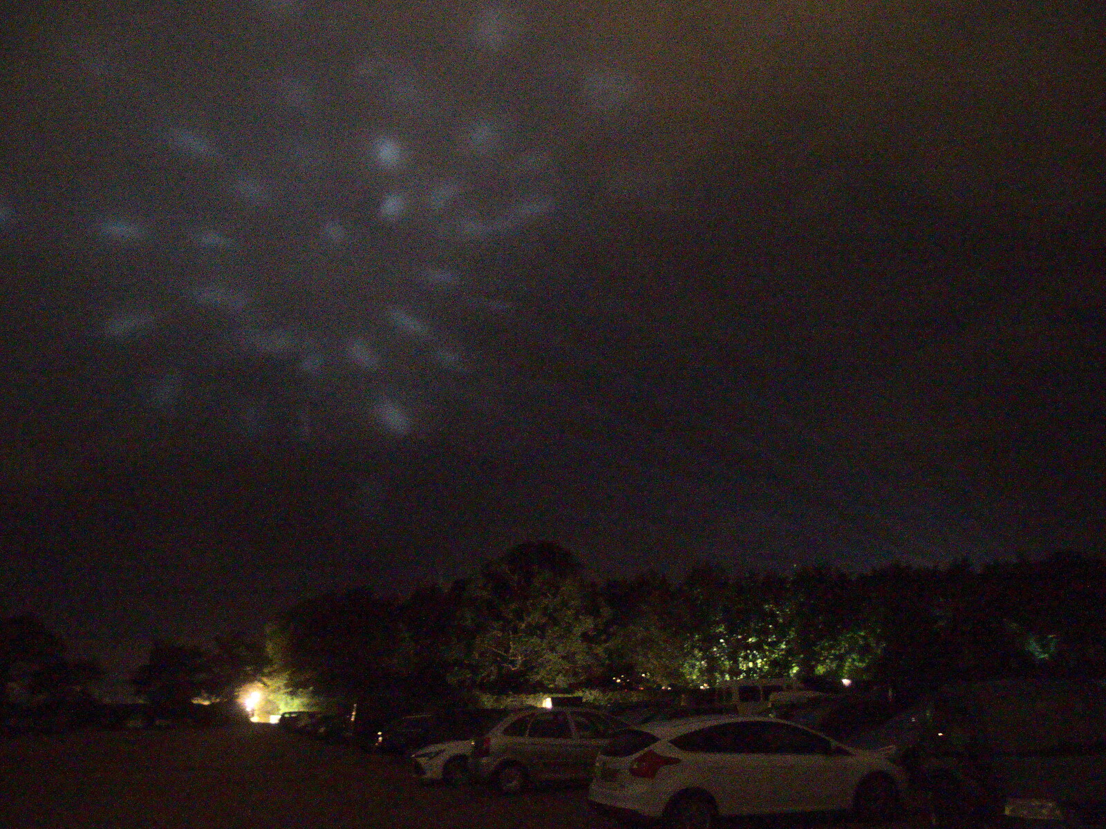 Lights reflect from the bottom of the clouds from Maui Waui Festival, Hill Farm, Gressenhall, Norfolk - 28th August 2021