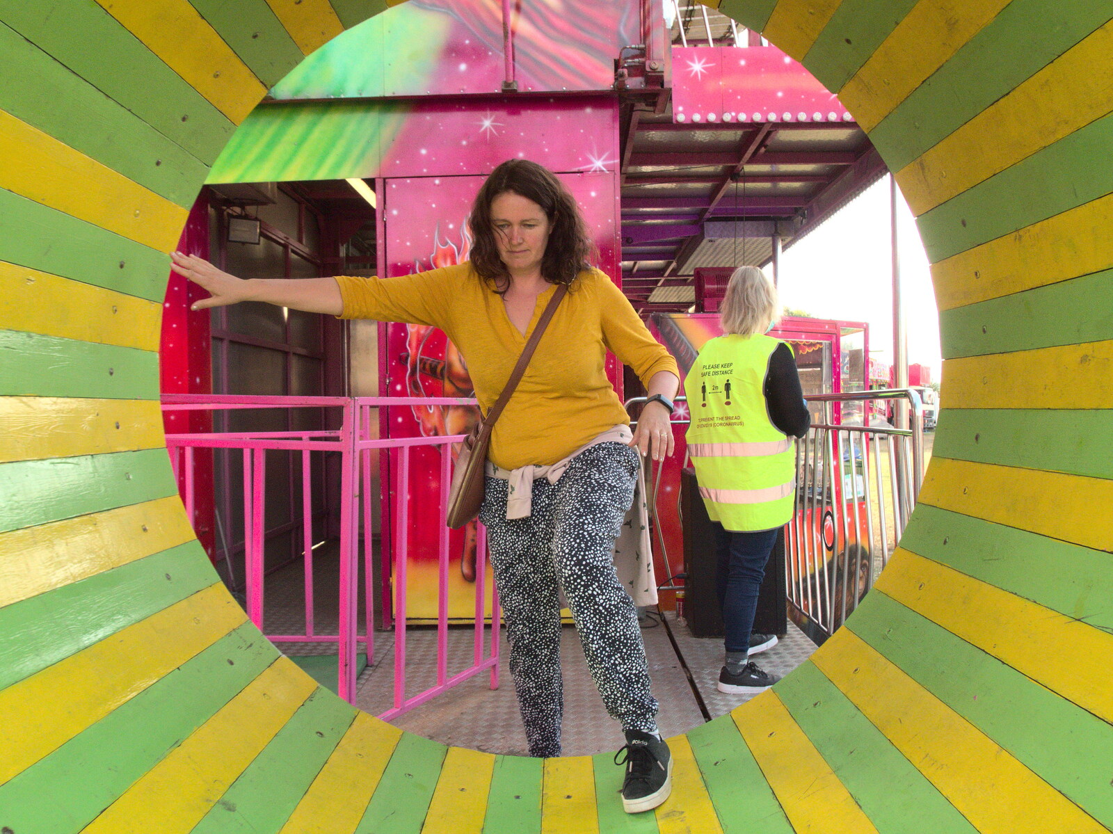 Isobel exits through the spinning wheel from A Few Hours at the Fair, Fair Green, Diss, Norfolk - 5th September 2021