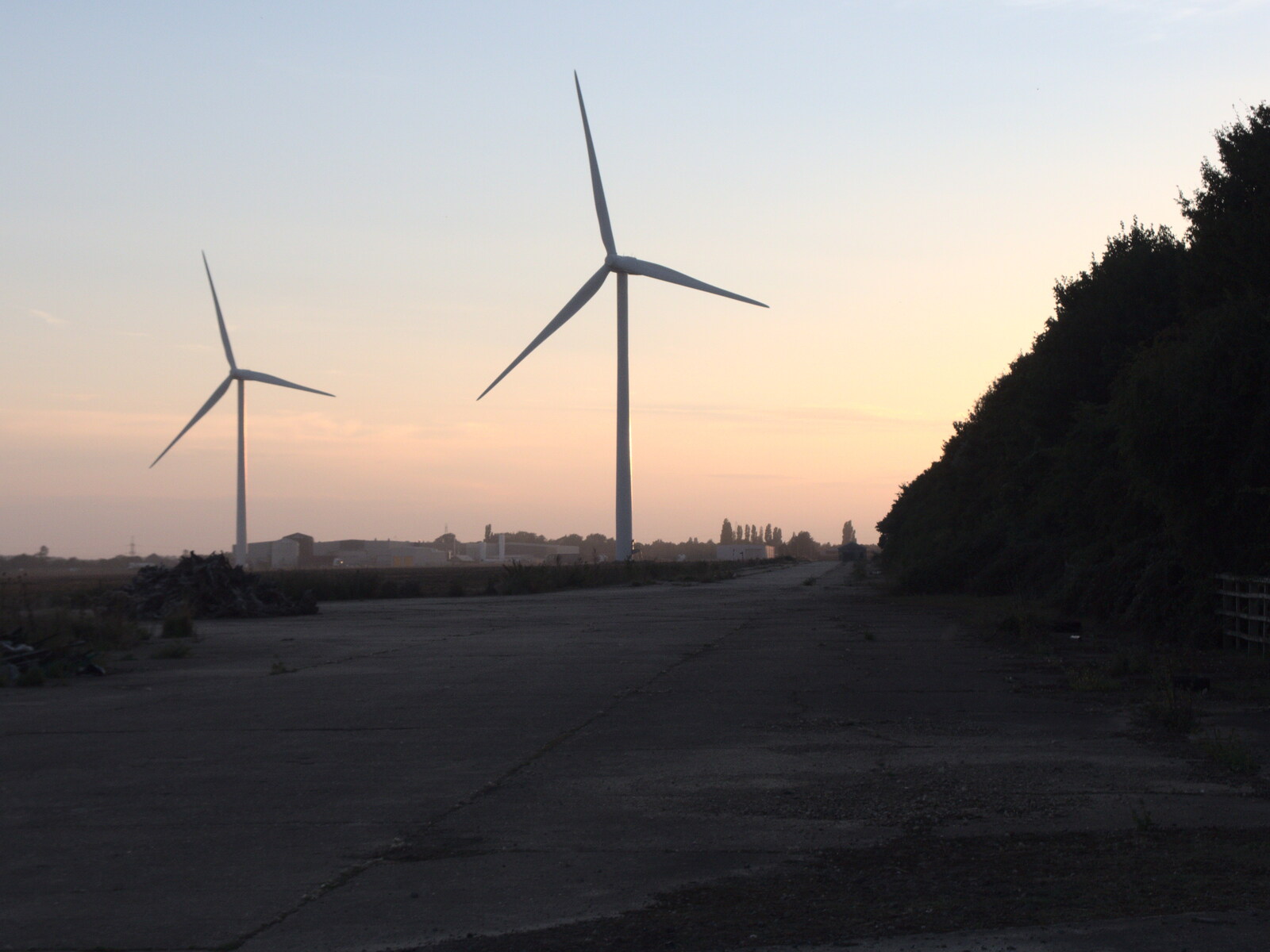 The Last Weavers Ever, Market Hill, Diss, Norfolk - 10th September 2021: Wind turbines in the dusk
