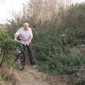 Mick hauls his bike through the undergrowth, The Last Weavers Ever, Market Hill, Diss, Norfolk - 10th September 2021