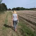 Isobel heads off round the fields, A Summer Party and an Airfield Walk with Clive, Brome, Suffolk - 11th September 2021