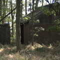 2021 An old airfield building with a blast wall
