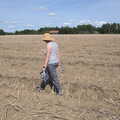 Isobel walks along the potato rows, A Summer Party and an Airfield Walk with Clive, Brome, Suffolk - 11th September 2021