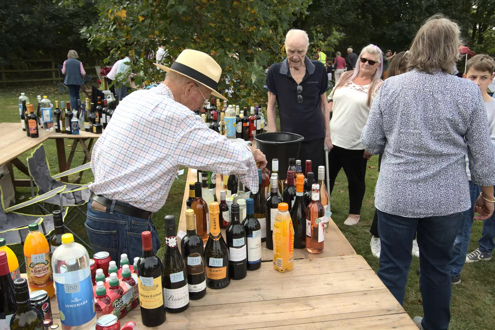 Grandad wins some Martini, from The Brome and Oakley Fête, Oakley Hall, Suffolk - 19th September 2021