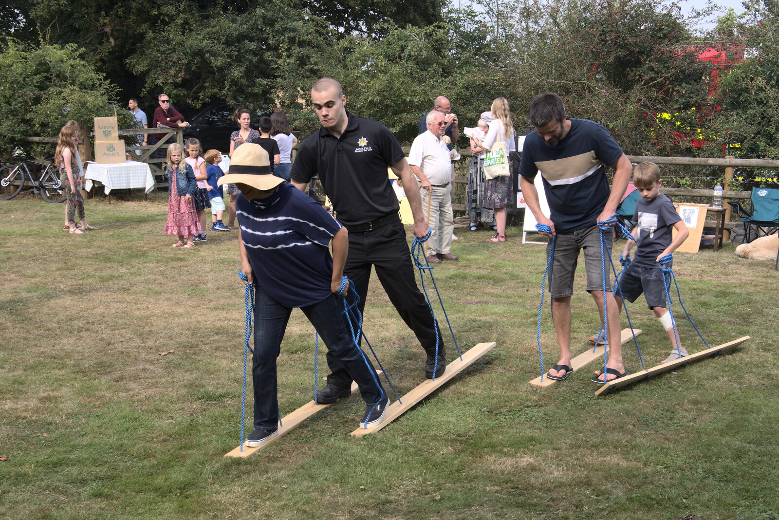 The other fireman enters the grass-skiing event from The Brome and Oakley Fête, Oakley Hall, Suffolk - 19th September 2021
