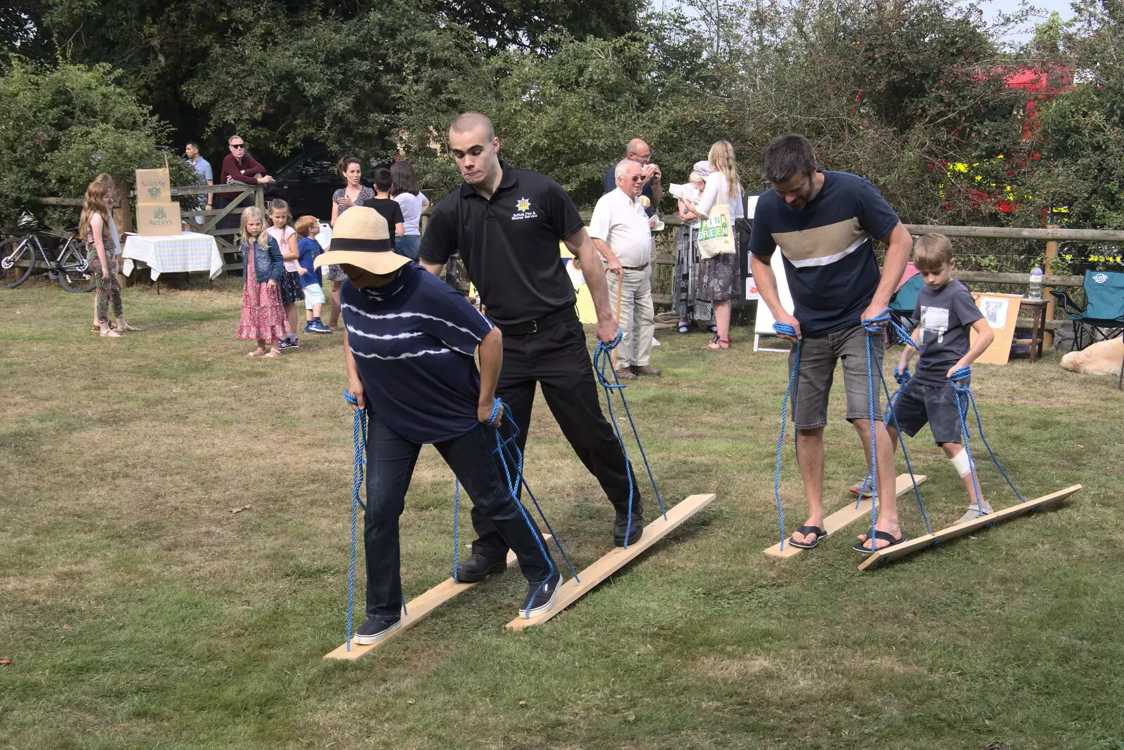 The other fireman enters the grass-skiing event, from The Brome and Oakley Fête, Oakley Hall, Suffolk - 19th September 2021