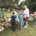 Isobel buys some things, The Brome and Oakley Fête, Oakley Hall, Suffolk - 19th September 2021