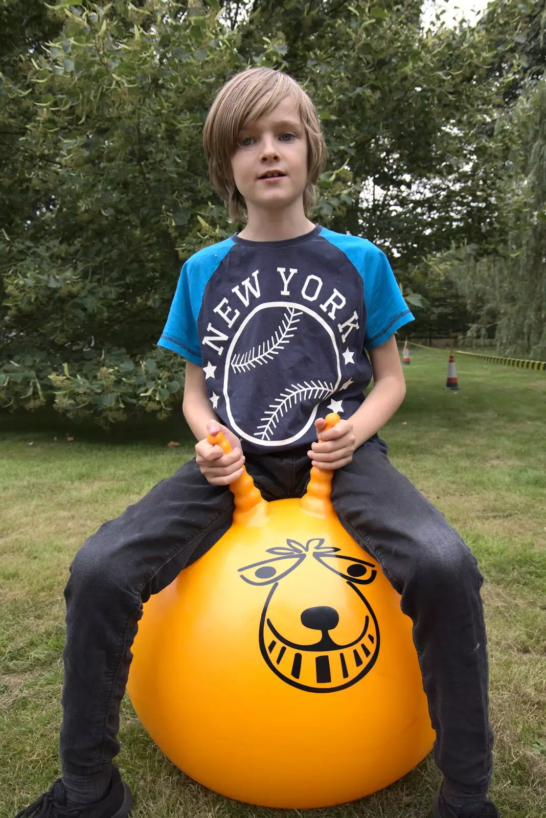 Harry has a bounce on a Space Hopper, from The Brome and Oakley Fête, Oakley Hall, Suffolk - 19th September 2021