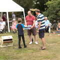 Harry wins a prize, The Brome and Oakley Fête, Oakley Hall, Suffolk - 19th September 2021