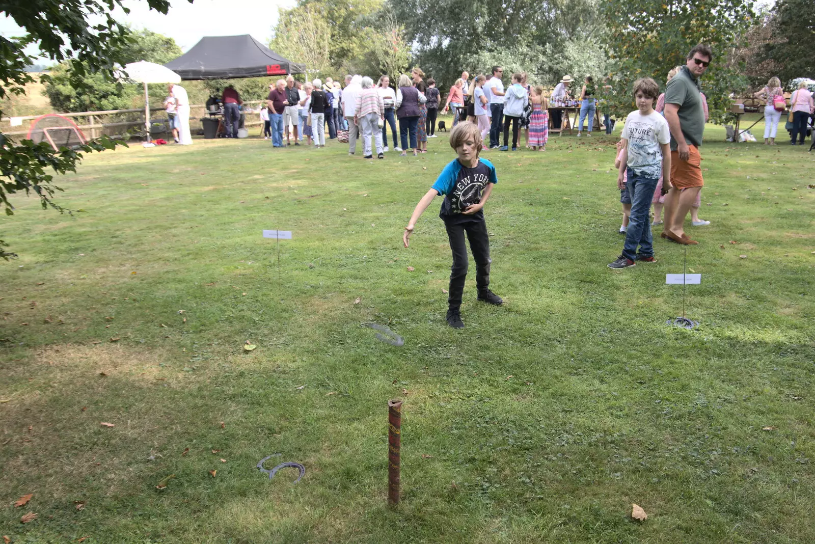 Harry plays quoits, from The Brome and Oakley Fête, Oakley Hall, Suffolk - 19th September 2021