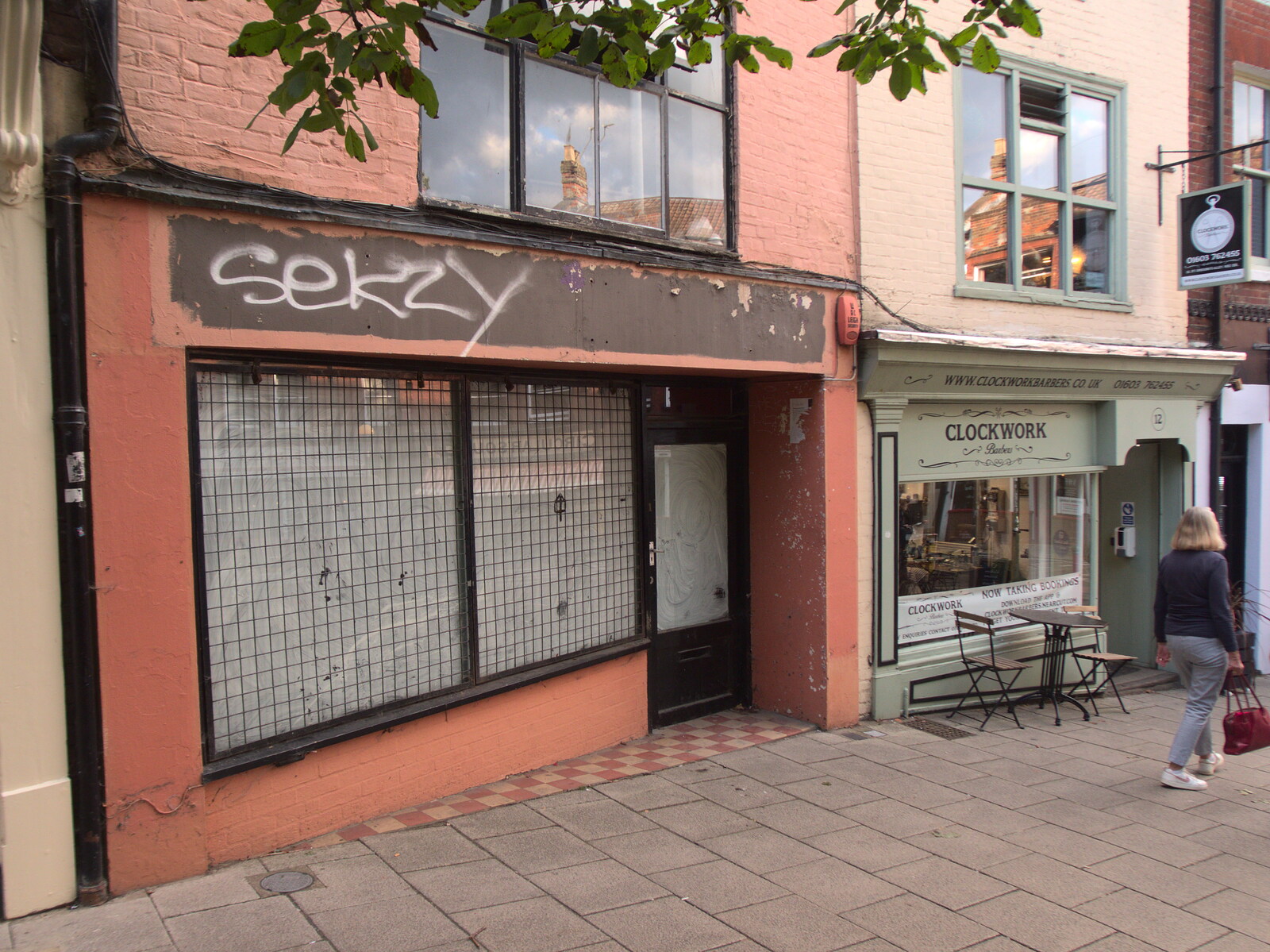 A closed-down shop has been sprayed 'Sekzy' from BSCC at Ampersand and Birthday Lego at Jarrold's, Norwich, Norfolk - 25th September 2021